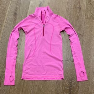 Lulu lemon pink swiftly tech 1/2 zip!  Brand new w out tags!! Very cute! Size 4